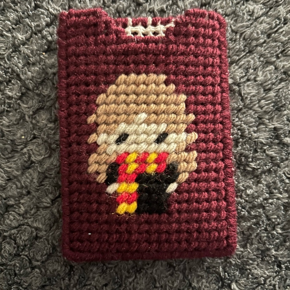 Handcrafted Crochet card Sleeve with Gryffindor-Inspired Character